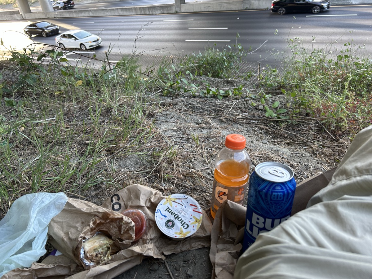 Super burrito, Chobani, Gatorade orange cap, Bud Light — field lunch under the bridge — structural engineering soil sample site — East Bay 925